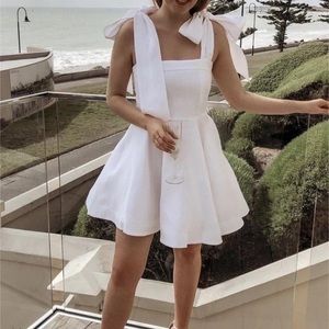 White dress from boutique. New with tags